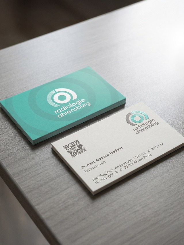 Business cards for both owner-physicians